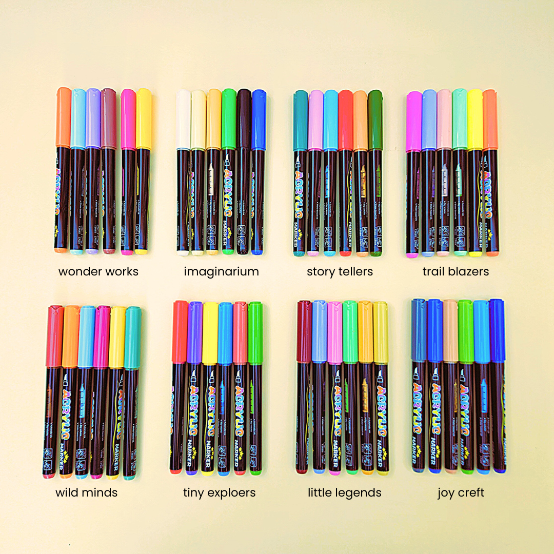 Set of colorful markers with labels on a beige background