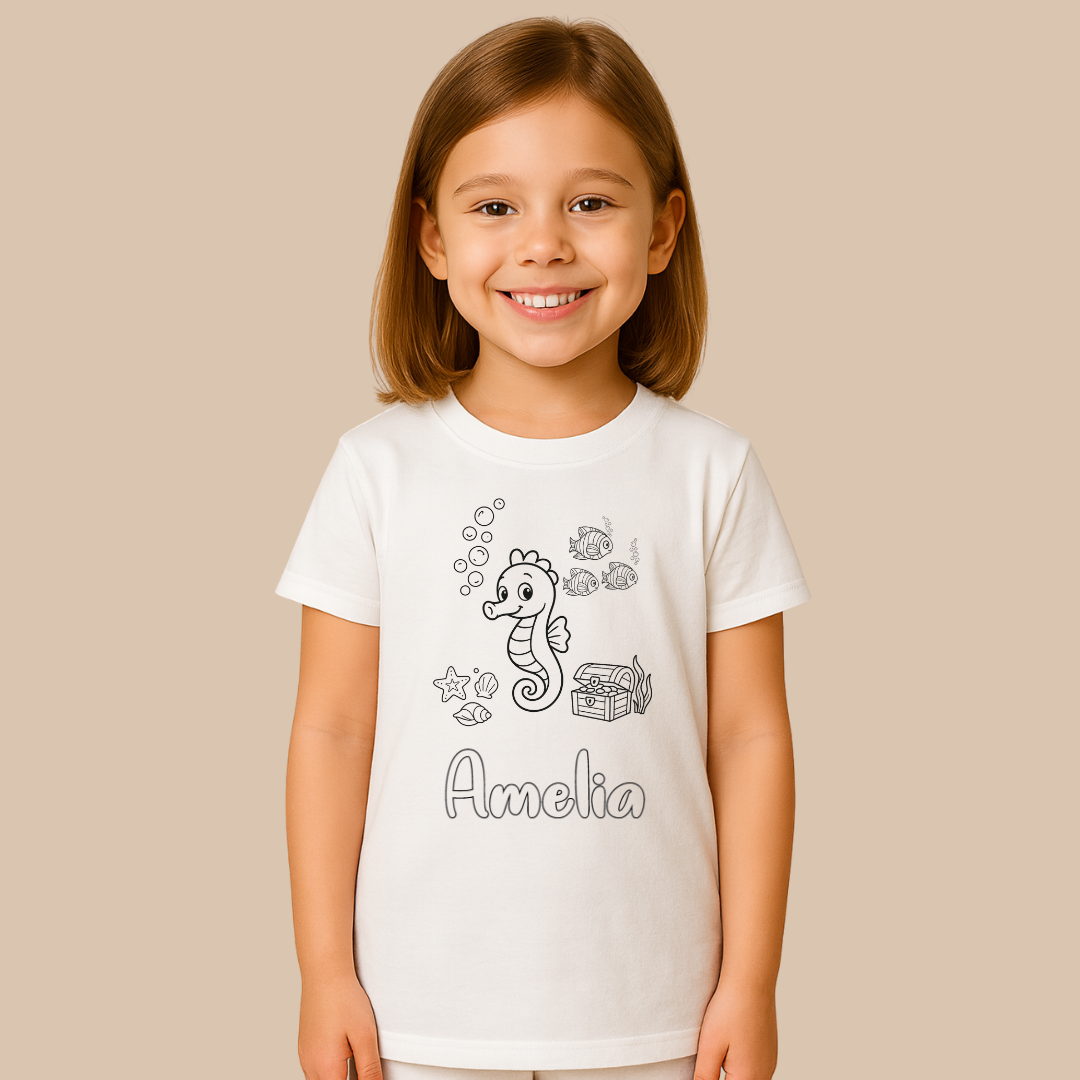 Child wearing a white t-shirt with a seahorse design and the name 'Amelia' on a beige background