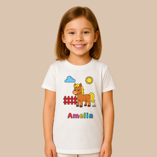 Child wearing a white t-shirt with a horse graphic and the name 'Amelia' on a beige background