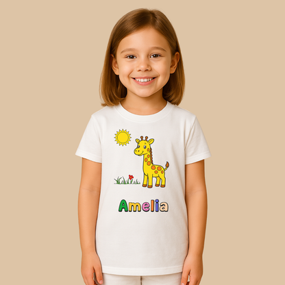 Child wearing a white t-shirt with a giraffe graphic and the name 'Amelia' on a beige background