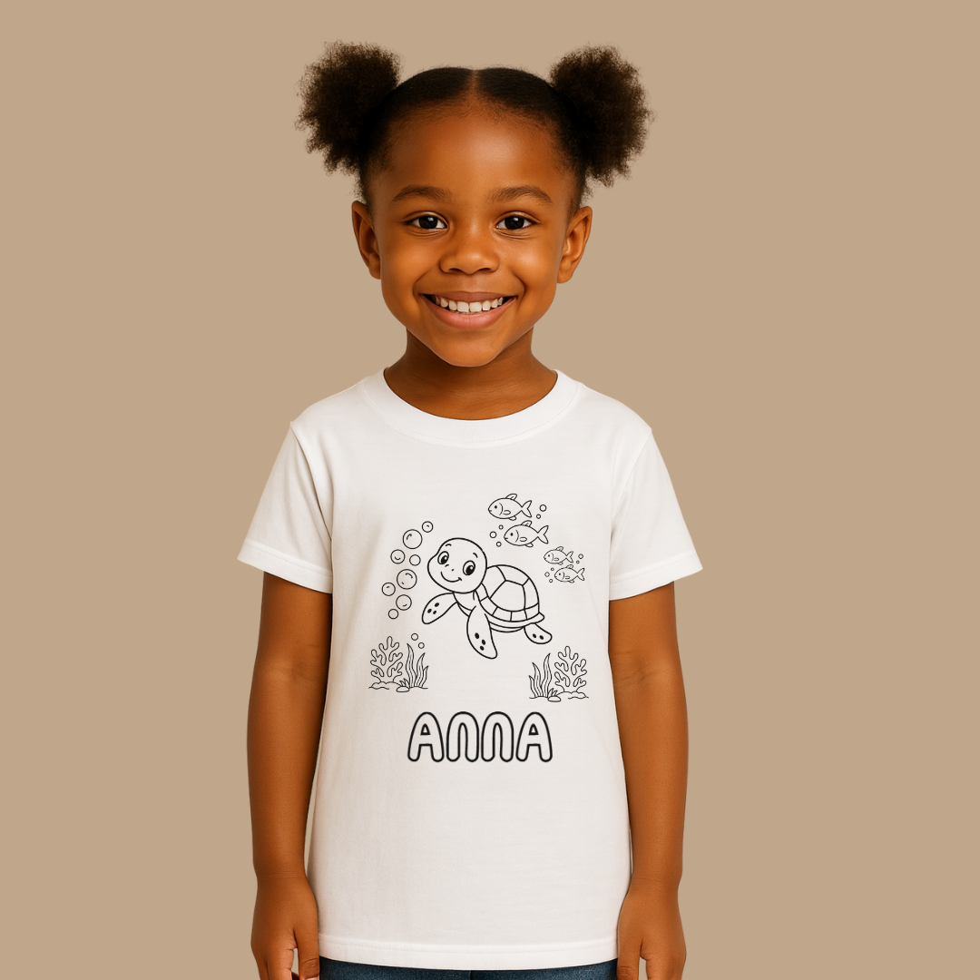 Child wearing a white t-shirt with a turtle design and the name 'Anna' on a beige background