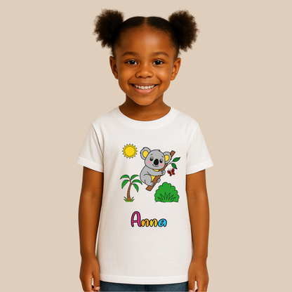 Child wearing a white t-shirt with a koala design and the name 'Anna' on a beige background