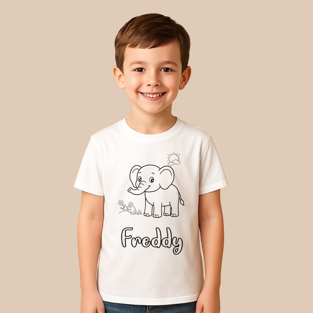 Child wearing a white t-shirt with an elephant design and the name 'Freddy' on a beige background