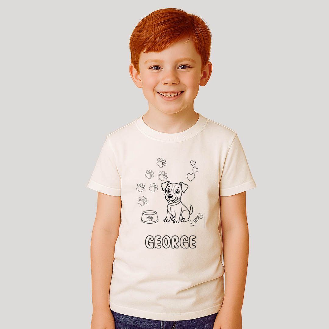Child wearing a white t-shirt with a dog illustration and 'GEORGE' text on a plain background