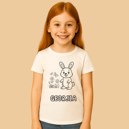 Child wearing a white t-shirt with a rabbit design and 'GEORGIA' text on a beige background