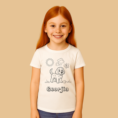 Young girl wearing a white t-shirt with a dog illustration and 'Georgia' text on a beige background