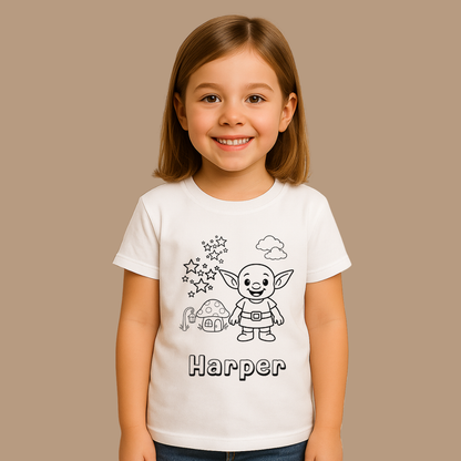 Child wearing a white t-shirt with a cartoon character and 'Harper' printed on it against a beige background