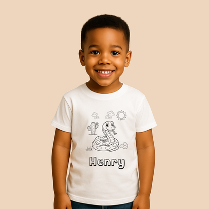 Child wearing a white t-shirt with a snake graphic and 'Henry' text on a beige background