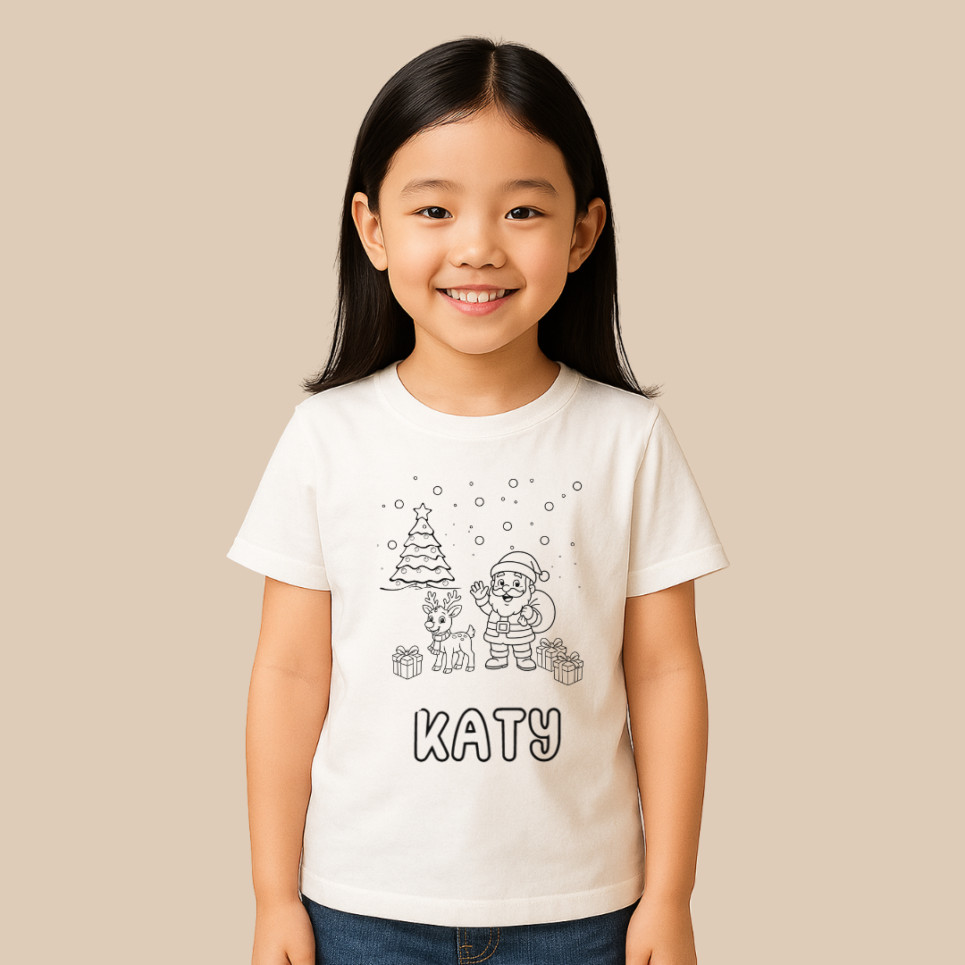 Young girl wearing a white t-shirt with a Christmas design and the name 'KATY'.