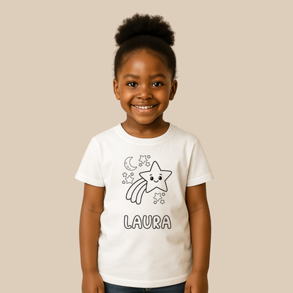 Child wearing a white t-shirt with a star and moon design and the name 'Laura'.