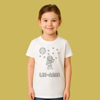 Child wearing a white t-shirt with space-themed design and name 'LEE-ANNE' on a yellow background