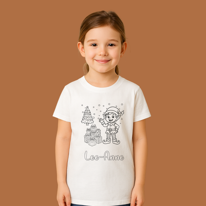 Young girl wearing a white t-shirt with a printed design and name on a brown background