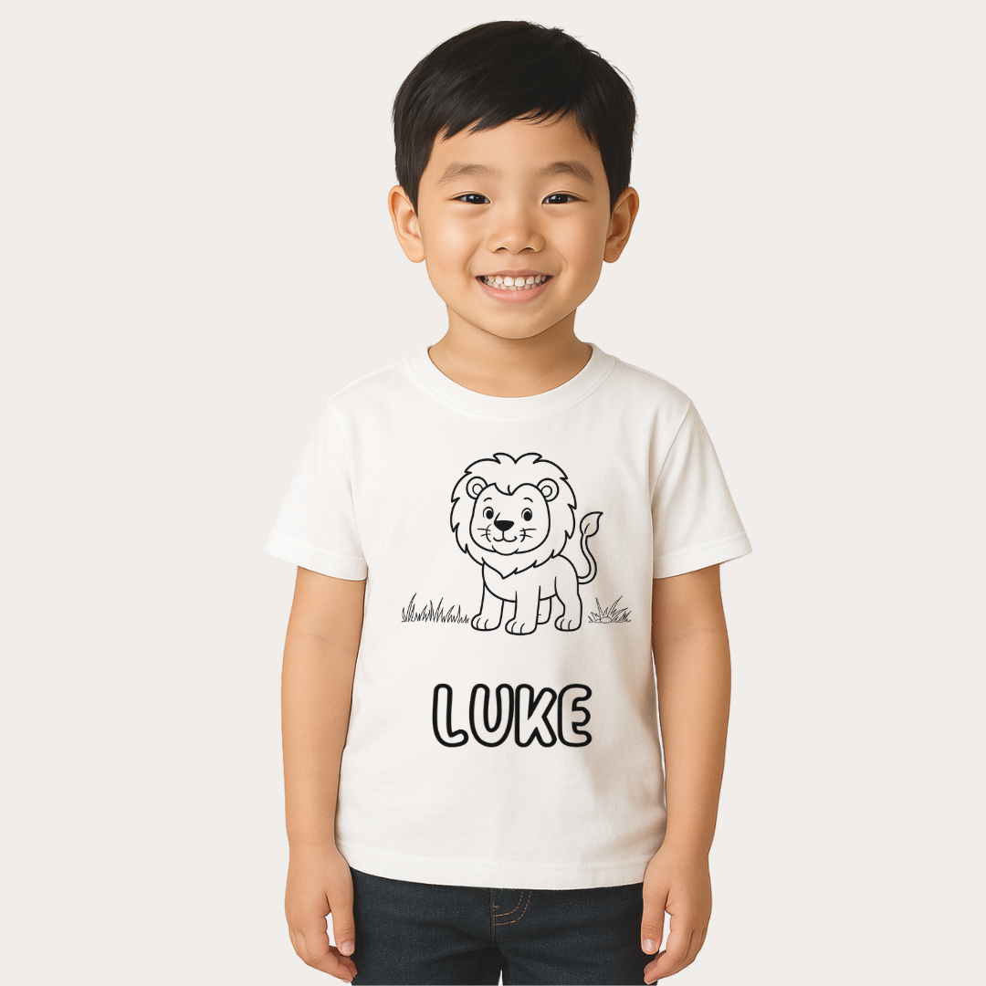 Child wearing a white t-shirt with a lion graphic and the name 'LUKE' on a white background