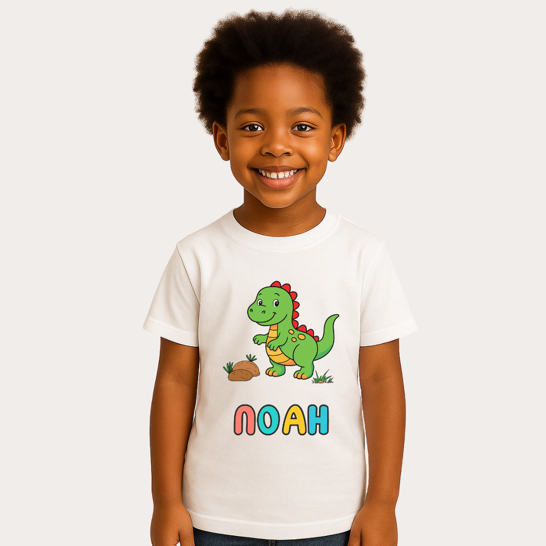 Child wearing a white t-shirt with a dinosaur graphic and the name 'Noah' on a white background