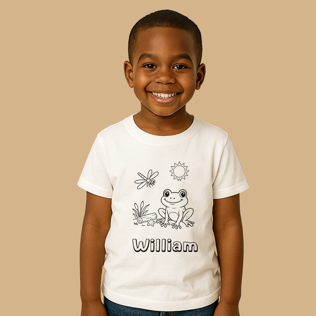 Child wearing a white t-shirt with a frog design and the name 'William' on a beige background
