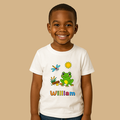 Child wearing a white t-shirt with colorful graphics and the name 'William' on a beige background