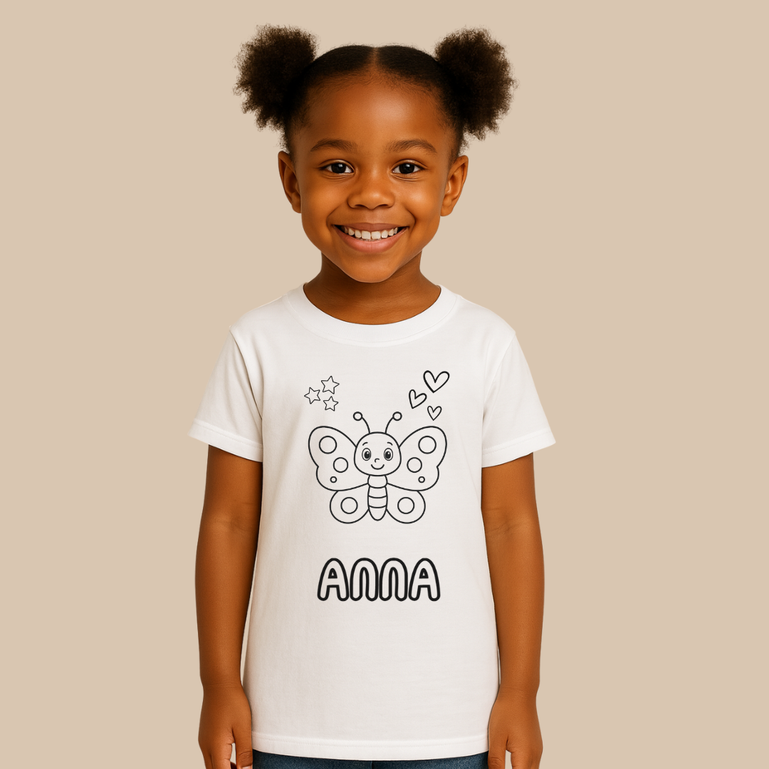 Child wearing a white t-shirt with a butterfly design and the name 'Anna' on a beige background