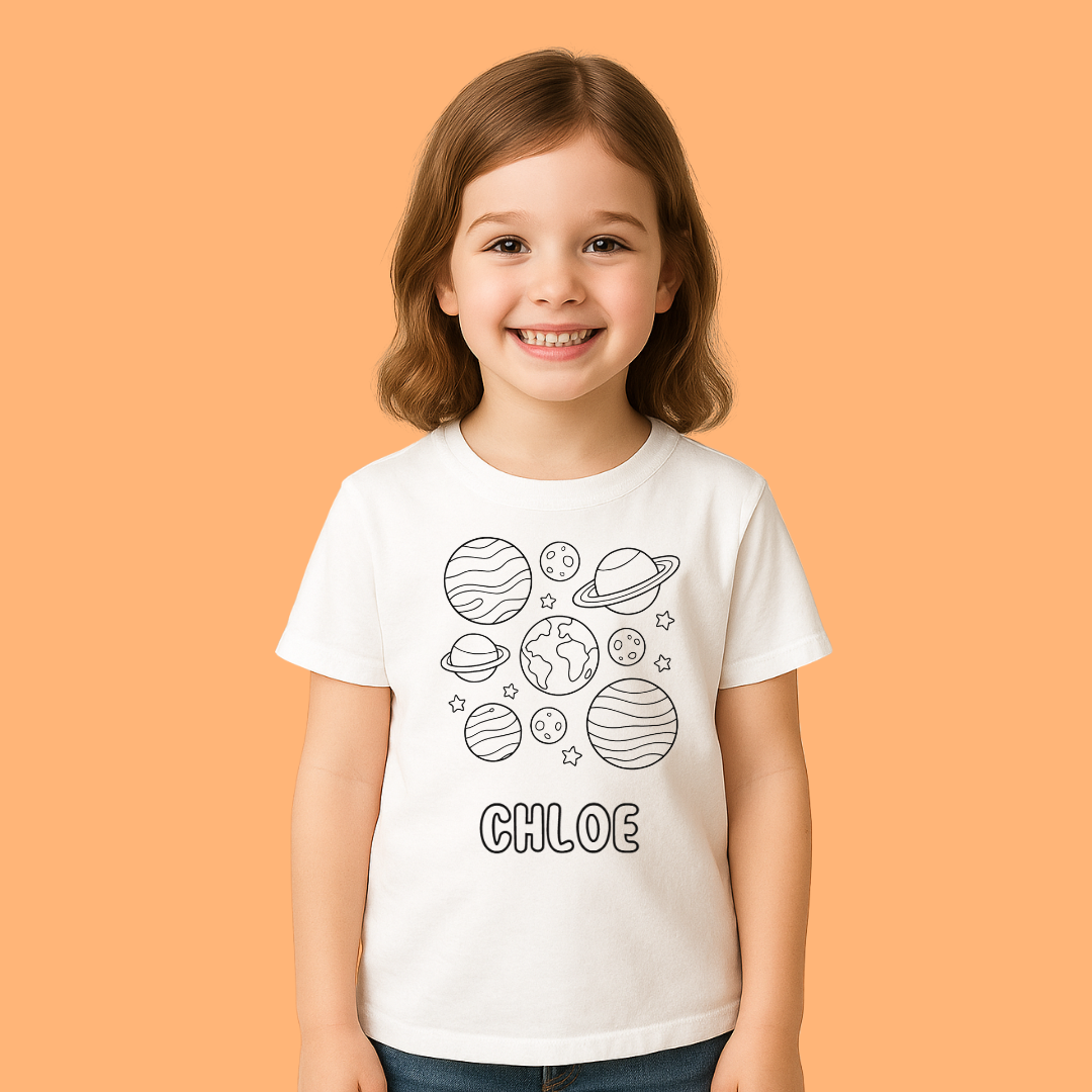 Child wearing a white t-shirt with space-themed designs and the name 'Chloe' on an orange background