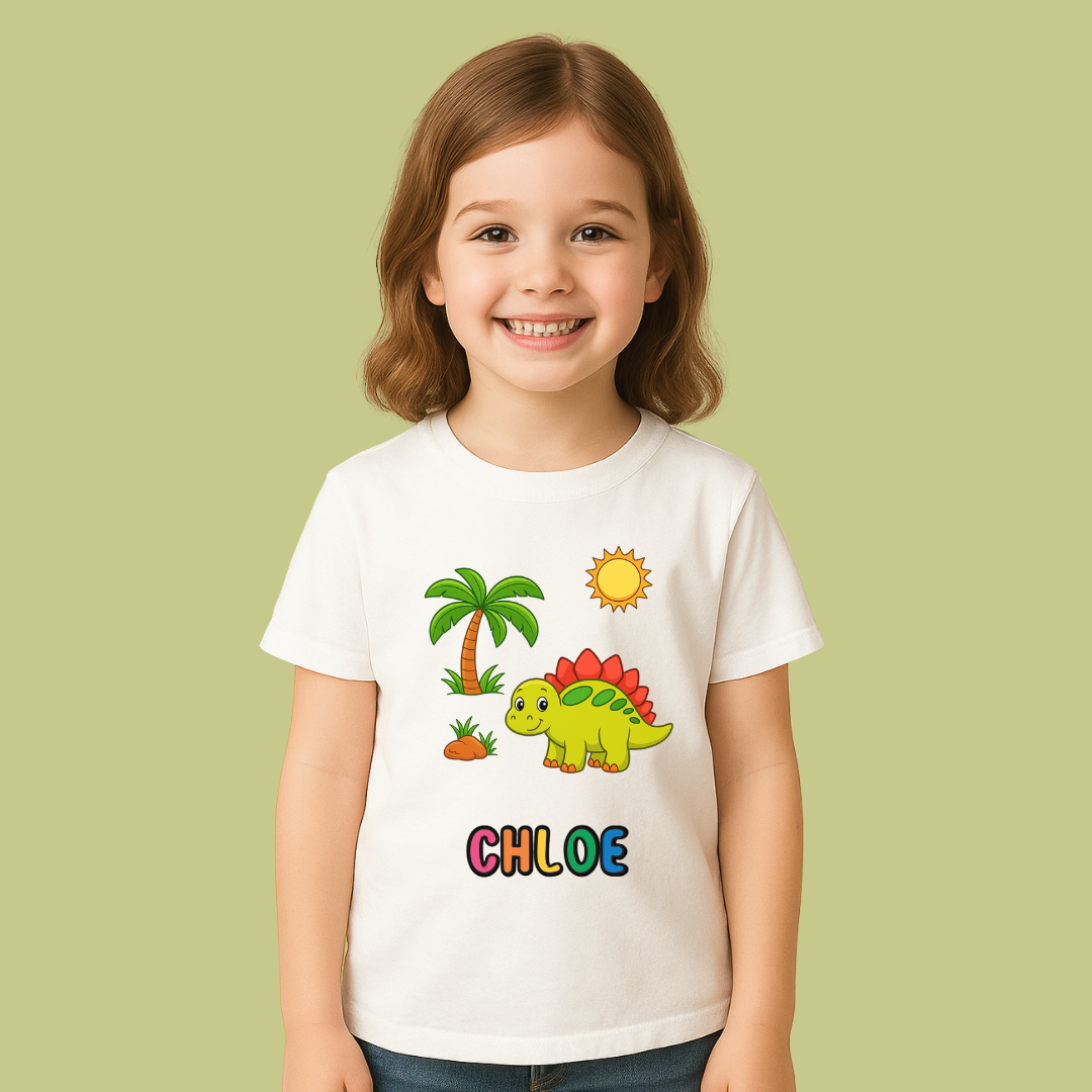 Child wearing a white t-shirt with a dinosaur design and the name 'Chloe' on a light green background