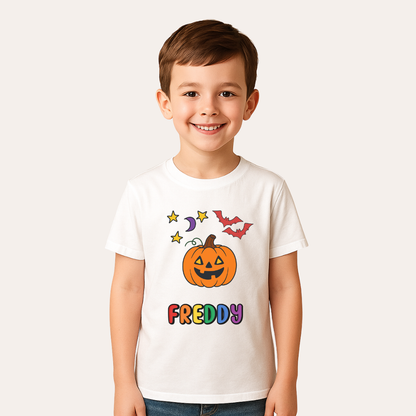 Child wearing a white t-shirt with Halloween-themed design and name 'Freddy'.