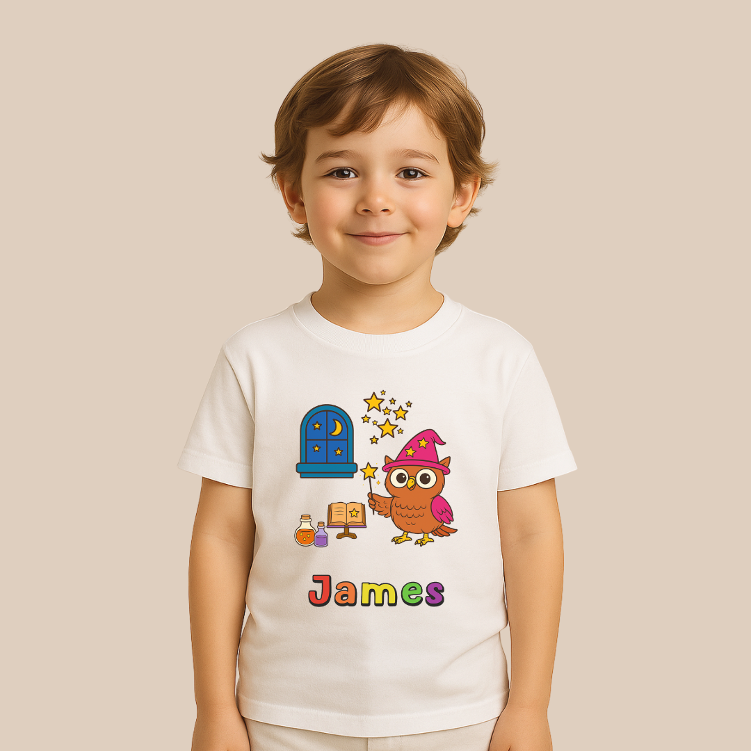 Child wearing a white t-shirt with a colorful owl design and the name 'James' on a beige background