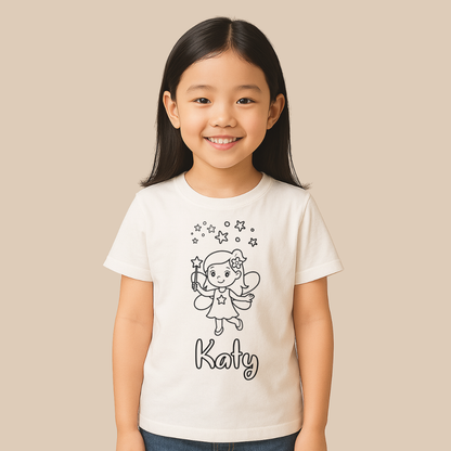 Young girl wearing a white t-shirt with a fairy design and the name 'Katy' on a beige background