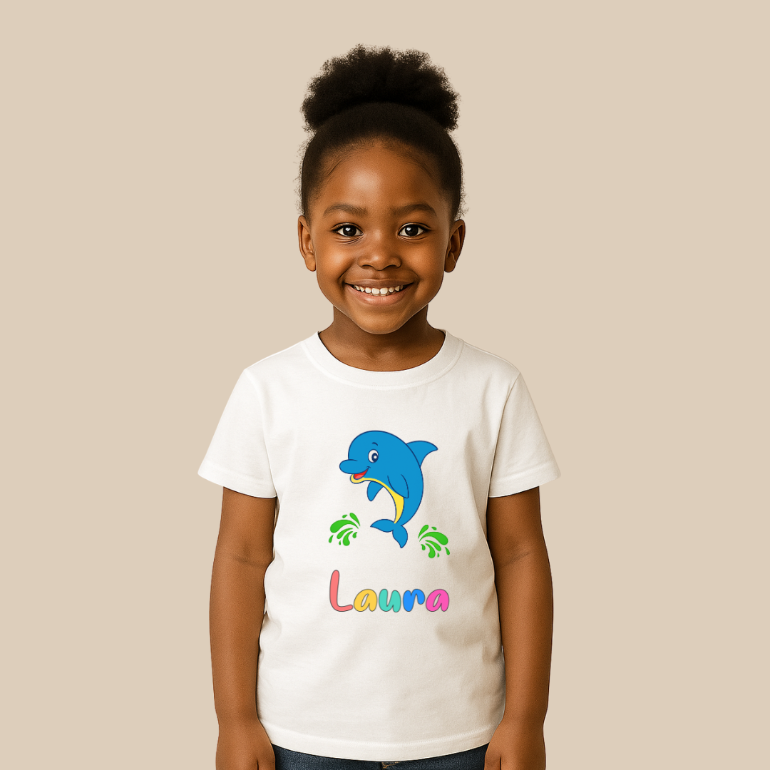 Child wearing a white t-shirt with a dolphin graphic and the name 'Laura' on a beige background