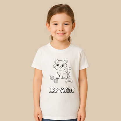 Child wearing a white t-shirt with a cat illustration and 'LEE-ANNE' text on a beige background