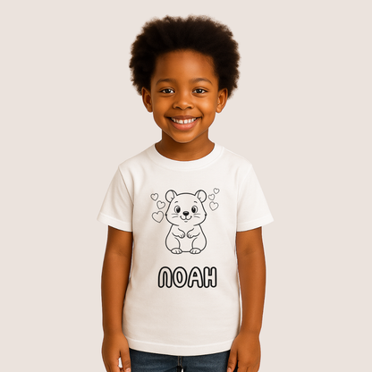Child wearing a white t-shirt with a graphic of a hamster and the name 'NOAH' on a beige background